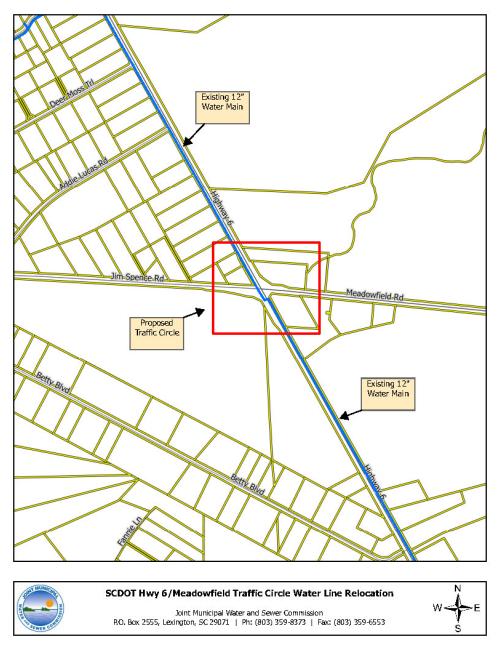 Map showing a proposed traffic circle and the relocation of a 12" water main at the intersection of Highway 6 and Meadowfield Rd in Lexington, SC.
